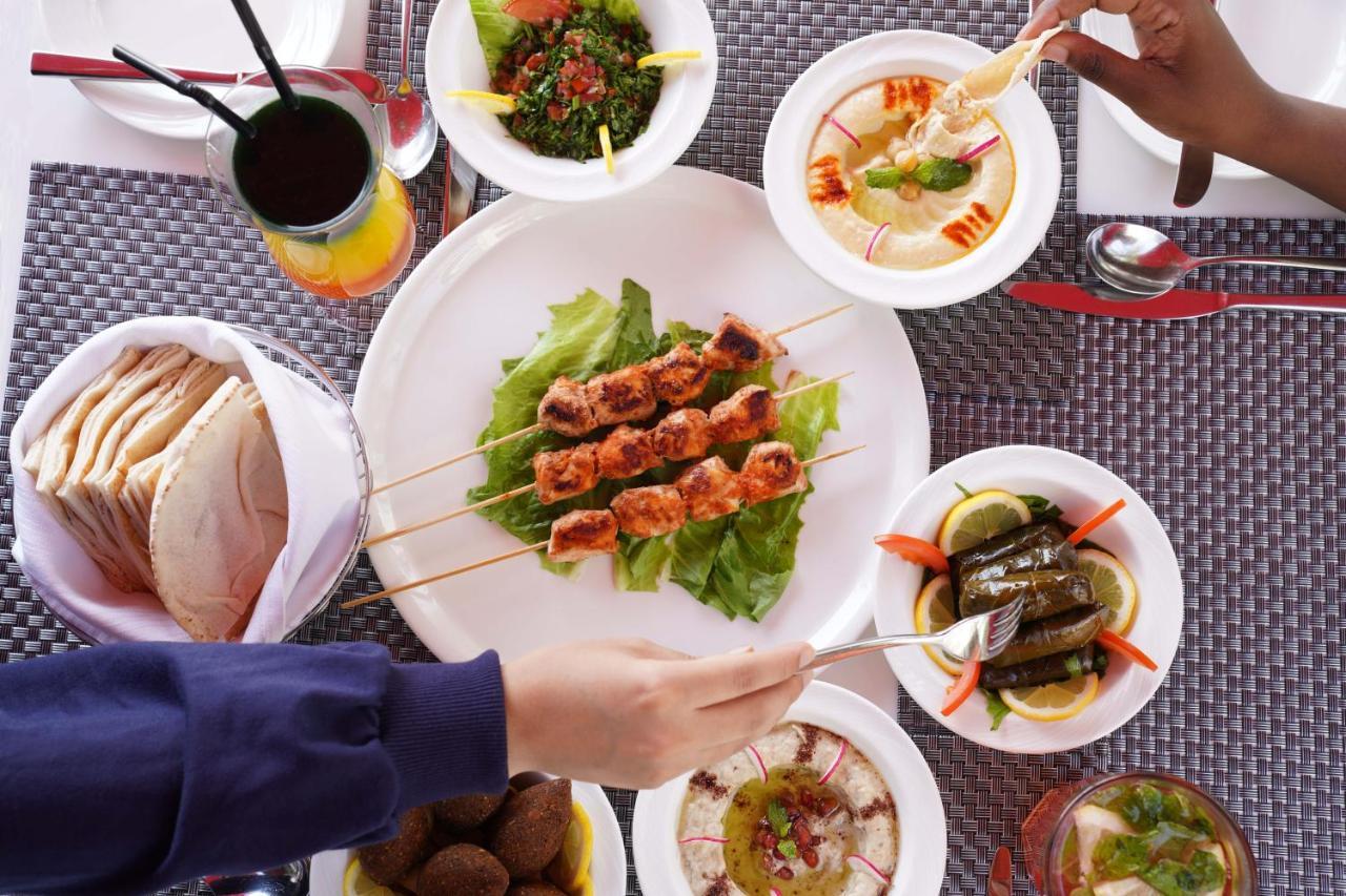 Majestic Arjaan By Rotana - Manama Aparthotel Ngoại thất bức ảnh A selection of Middle Eastern cuisine